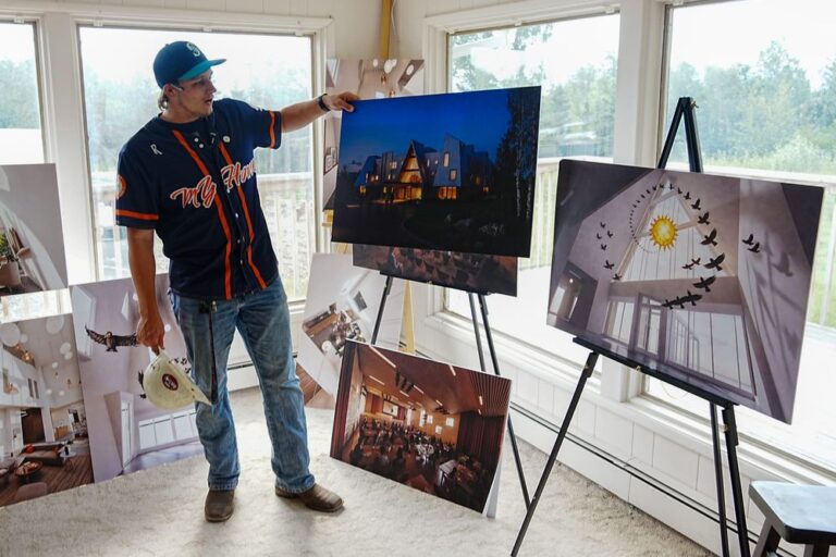 MyHouse Communications Director Isaac Smolden shows renderings of the finished Carson-Cottle Center in Wasilla on July 29, 2026.