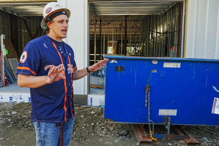 MyHouse Communications Director Isaac Smolden leads a tour at the new Carson-Cottle Center in Wasilla on July 29, 2026.