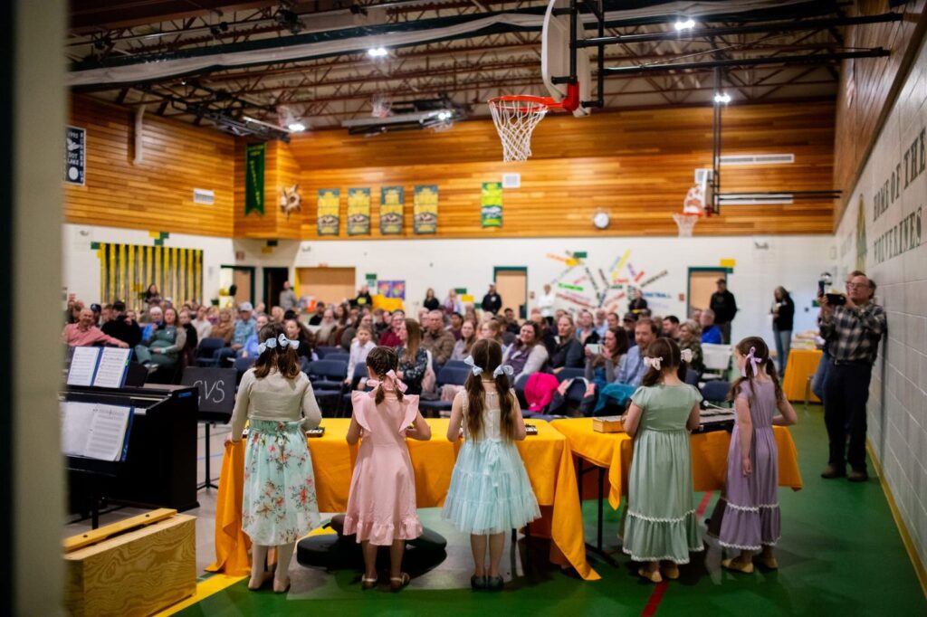 Glacier View School's first and second graders play alongside the large piano ensemble during their spring program on May 5, 2026.